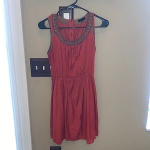 Burnt Orange colored sundress.